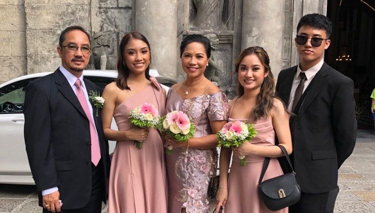 Nora and Bong with their three children, 2023